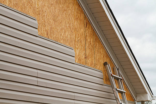 Professional Siding Contractor technician working in Mount Pleasant, OH